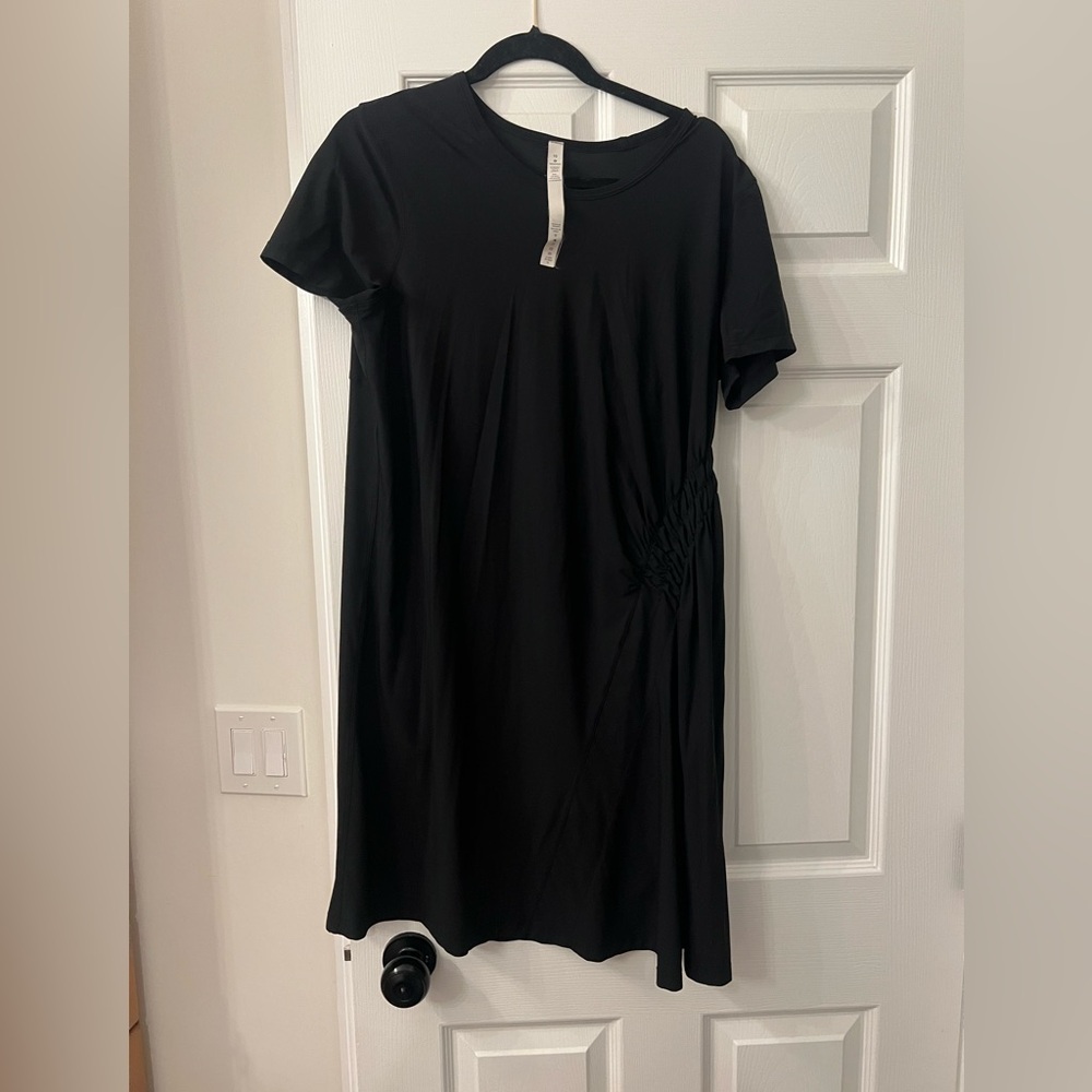Lululemon black tshirt dress with side detail.